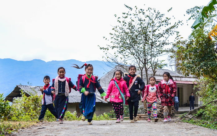 Vietnamese students near their primary school.